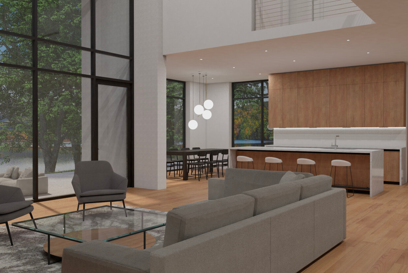 Clean-lined modernist furniture populates a seating area adjacent to a wood-paneled kitchen in this lake front house.