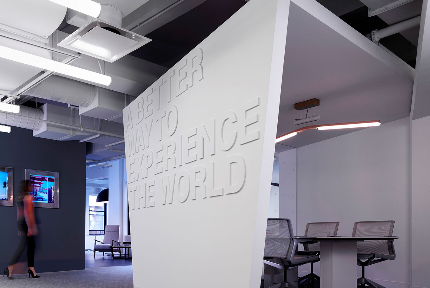 A sheltered conference room at the Starwood Design Studio is covered in brand messaging text